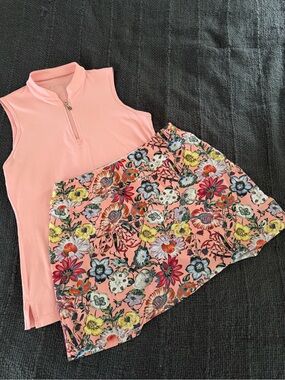 Sleeveless Sofibella Coral Zip Polo with Foray Coral Floral Skort